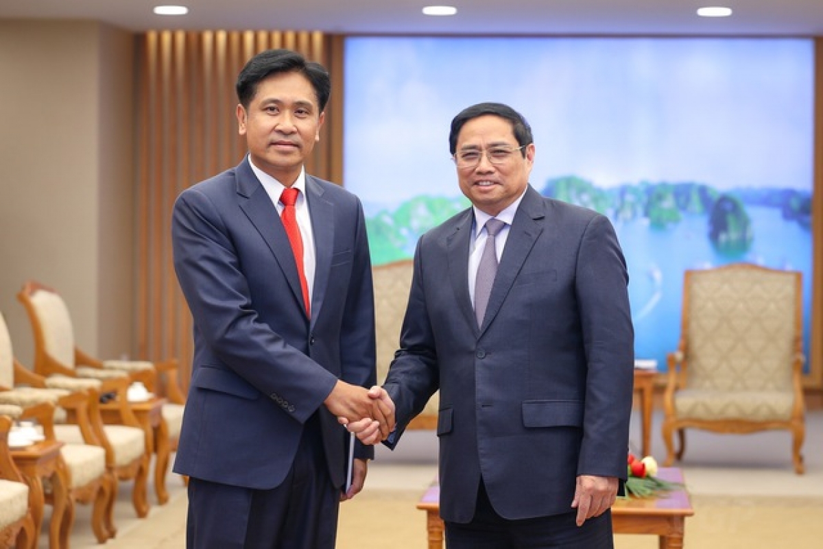 Thủ tướng Phạm Minh Chính tiếp Bộ trưởng Tư pháp Lào Phayvy Siboualypha. (Ảnh: Chinhphu.vn)