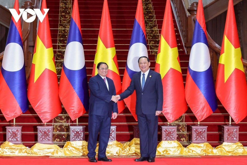 Thủ tướng Phạm Minh Chính và Thủ tướng Lào Sonexay Siphandone trong chuyến thăm chính thức CHDCND Lào (tháng 1/2023).