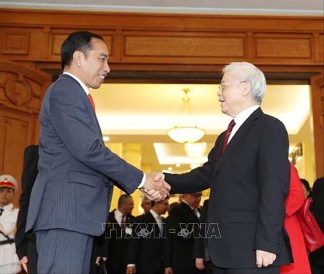 Ngày 12/9/2018, tại trụ sở Trung ương Đảng, Tổng Bí thư Nguyễn Phú Trọng đã tiếp thân mật ông Joko Widodo, Tổng thống nước Cộng hòa Indonesia đang có chuyến thăm cấp Nhà nước tại Việt Nam. (Ảnh: Trí Dũng - TTXVN)