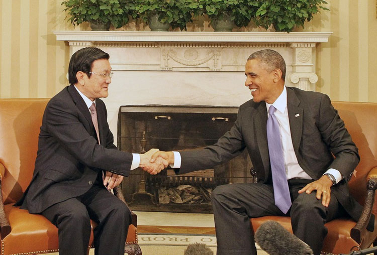 Chủ tịch nước Trương Tấn Sang và Tổng thống Barack Obama trong chuyến thăm lịch sử 7/2013, hai bên tuyên bố thiết lập quan hệ Đối tác toàn diện. (Ảnh: TTXVN)