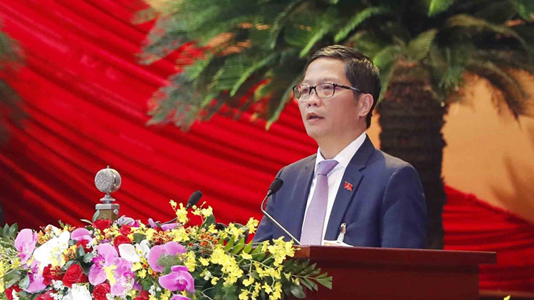 Bộ trưởng Bộ Công Thương Trần Tuấn Anh trình bày tham luận tại Đại hội XIII của Đảng.