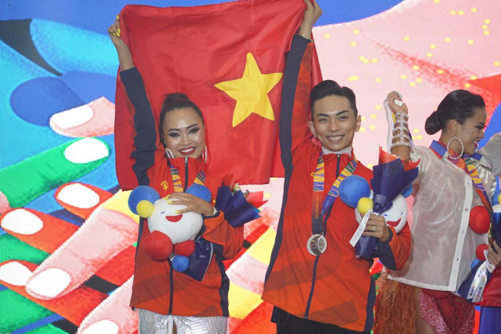 Hai vận động viên Phan Hiển - Nhã Uyên nhanh chóng gây chú ý khi xuất sắc giành huy chương vàng SEA Games 30 ở nội dung jive thuộc bộ môn Dance sport. 	Ảnh: K.T