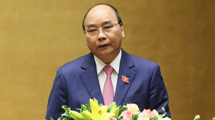 Thủ tướng Nguyễn Xuân Phúc trình bày báo cáo kinh tế - xã hội tại phiên khai mạc Kỳ họp thứ 8, Quốc hội khóa XIV.