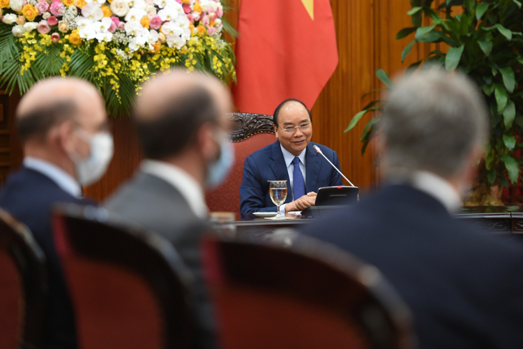 Thủ tướng Nguyễn Xuân Phúc: Chính sách tỷ giá của Việt Nam không nhằm mục đích tạo lợi thế cạnh tranh thương mại quốc tế - Nguồn ảnh: VGP