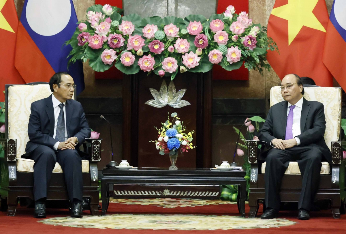 Chủ tịch nước Nguyễn Xuân Phúc khẳng định Đảng, Nhà nước và Nhân dân Việt Nam luôn hết sức coi trọng, quyết tâm gìn giữ và không ngừng vun đắp, phát triển mối quan hệ hữu nghị vĩ đại, đoàn kết đặc biệt và hợp tác toàn diện Việt Nam - Lào.